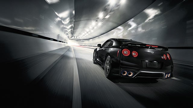 2023 Nissan GT-R seen from behind driving through a tunnel | Old Orchard Nissan in Skokie IL