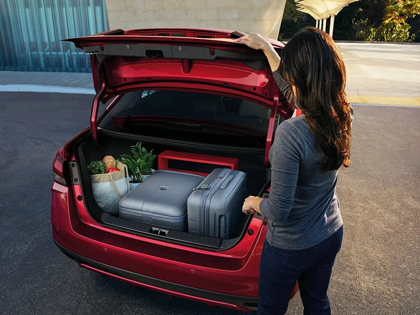 2025 Nissan Versa Trunk Cargo Space and Storage Capacity 2025 Nissan Versa sedan trunk with luggage and groceries
