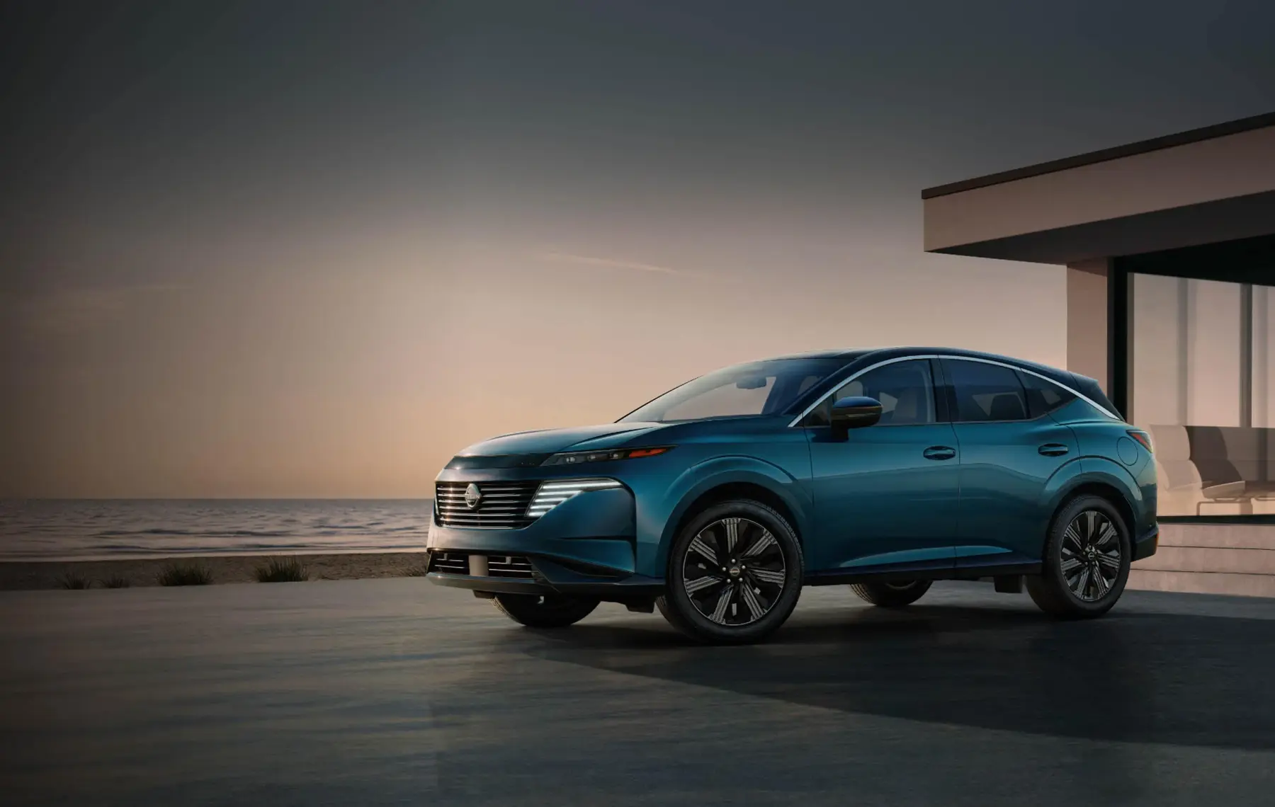 Blue 2026 Nissan Murano crossover with LED lighting, black roof, and premium alloy wheels