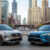 Nissan Rogue and Toyota RAV4 parked in city street