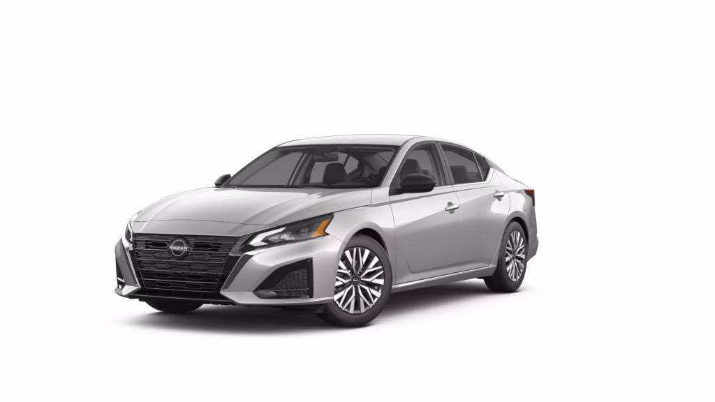 Silver Nissan Altima Sedan With Alloy Wheels Silver Nissan Altima sedan parked