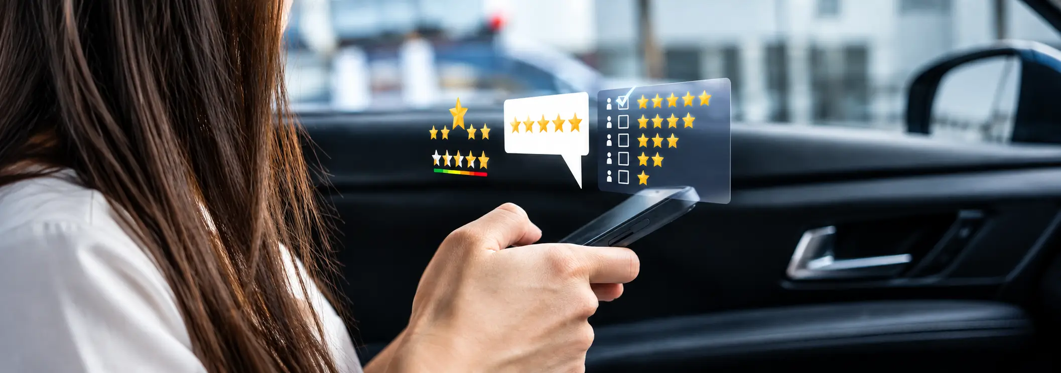 Customer Testimonials — Old Orchard Nissan A customer checking a dealership's star ratings and reviews on her phone from inside a car