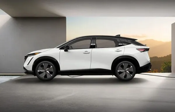 Nissan Ariya Electric SUV Profile View White Nissan Ariya electric suv side view