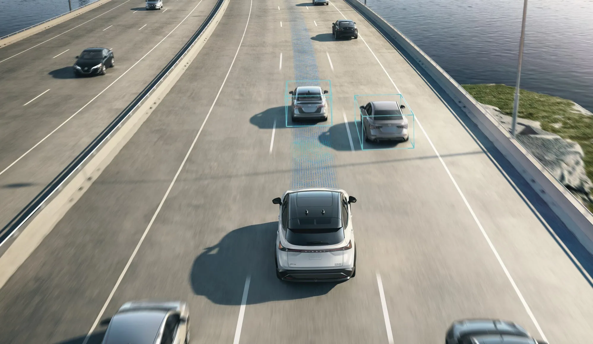 Nissan Ariya Highway Driving with Driver Assist Lane Guidance Nissan Ariya driving on multi-lane highway with surrounding vehicles and highlighted lane guidance