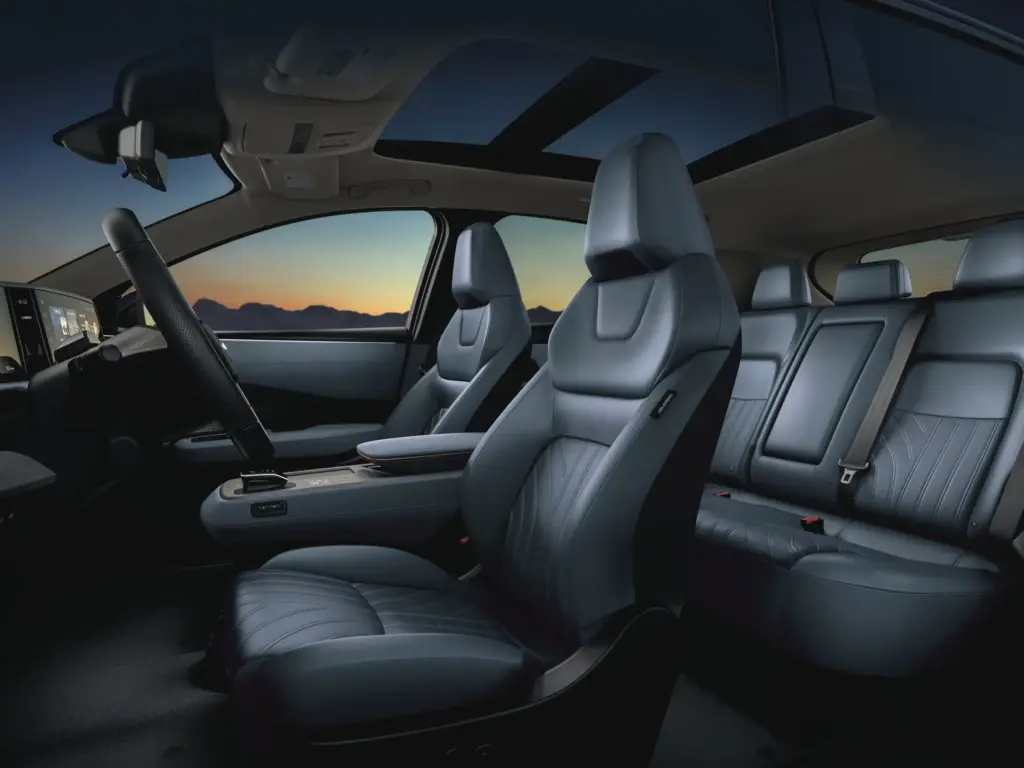 Nissan Ariya Interior Seats with Panoramic Glass Roof Nissan Ariya interior with front and rear seats and panoramic glass roof