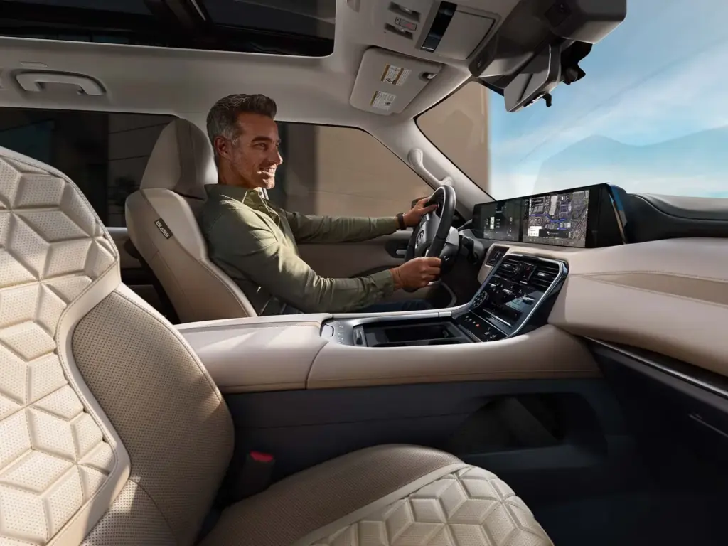 Nissan Armada Driver Cockpit and Premium Interior Driver inside Nissan Armada with digital display and premium interior