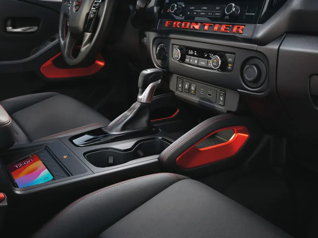 Nissan Frontier Center Console Storage and Connectivity Nissan Frontier center console with gear shifter and storage