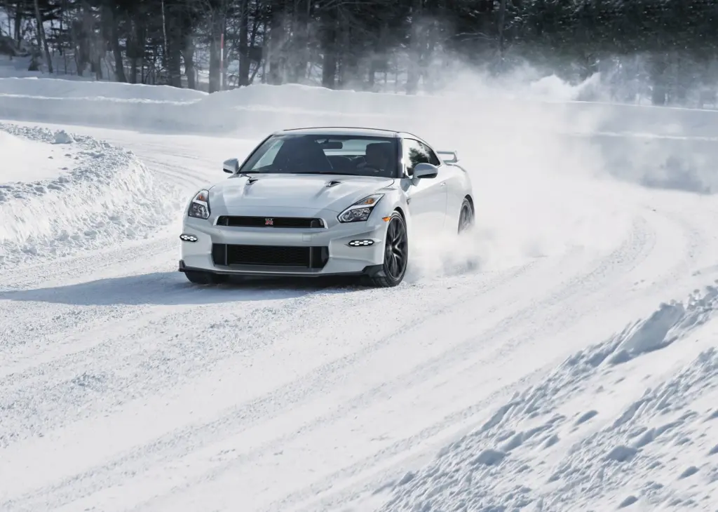 Nissan GT-R Winter Performance on Snow Track Nissan GT-R driving on snow-covered track in winter conditions