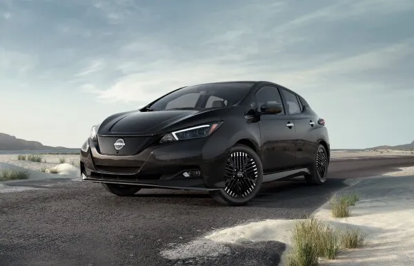 Nissan Leaf Electric Vehicle Outdoor Scene Black nissan leaf electric hatchback parked on scenic road