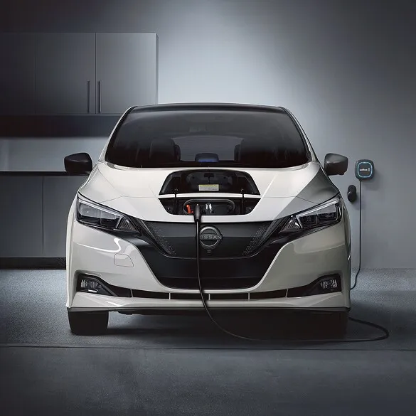 Nissan Leaf Home Electric Vehicle Charging Setup Nissan leaf electric car charging in home garage