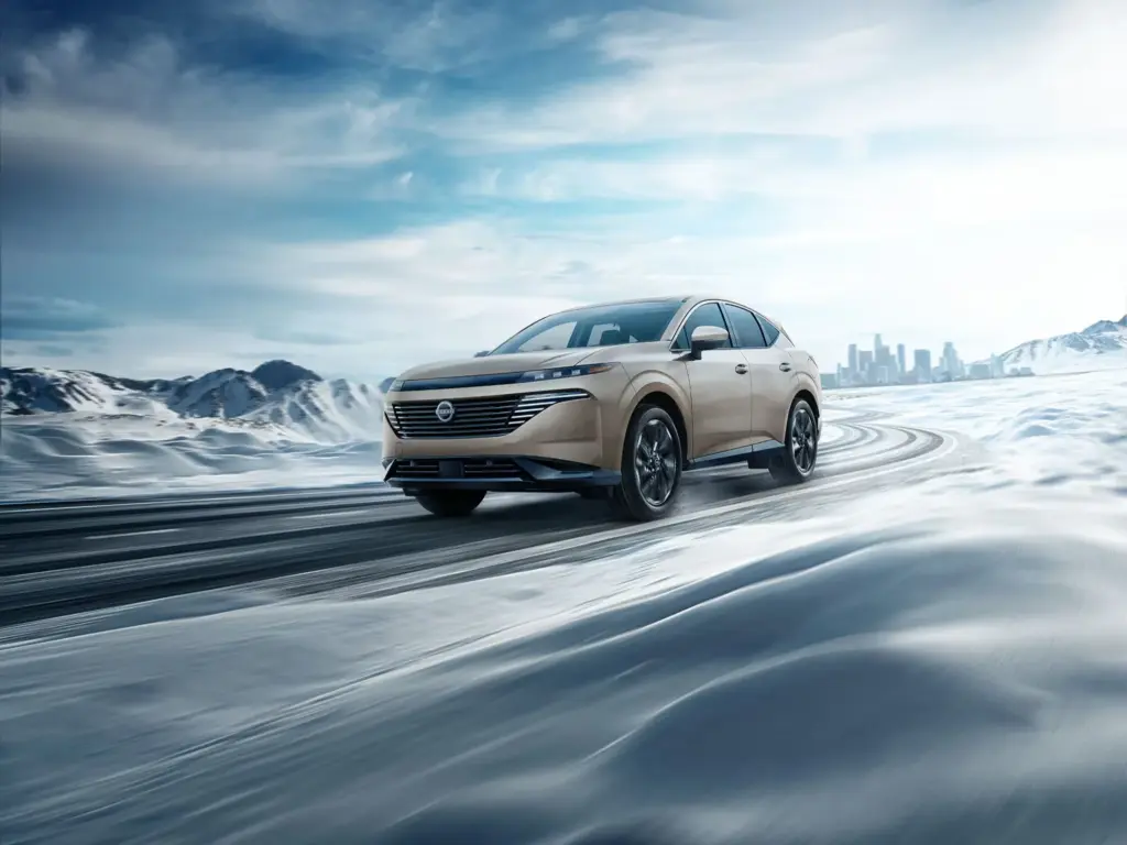 Nissan Murano Winter Driving Nissan Murano driving on snowy road in winter conditions