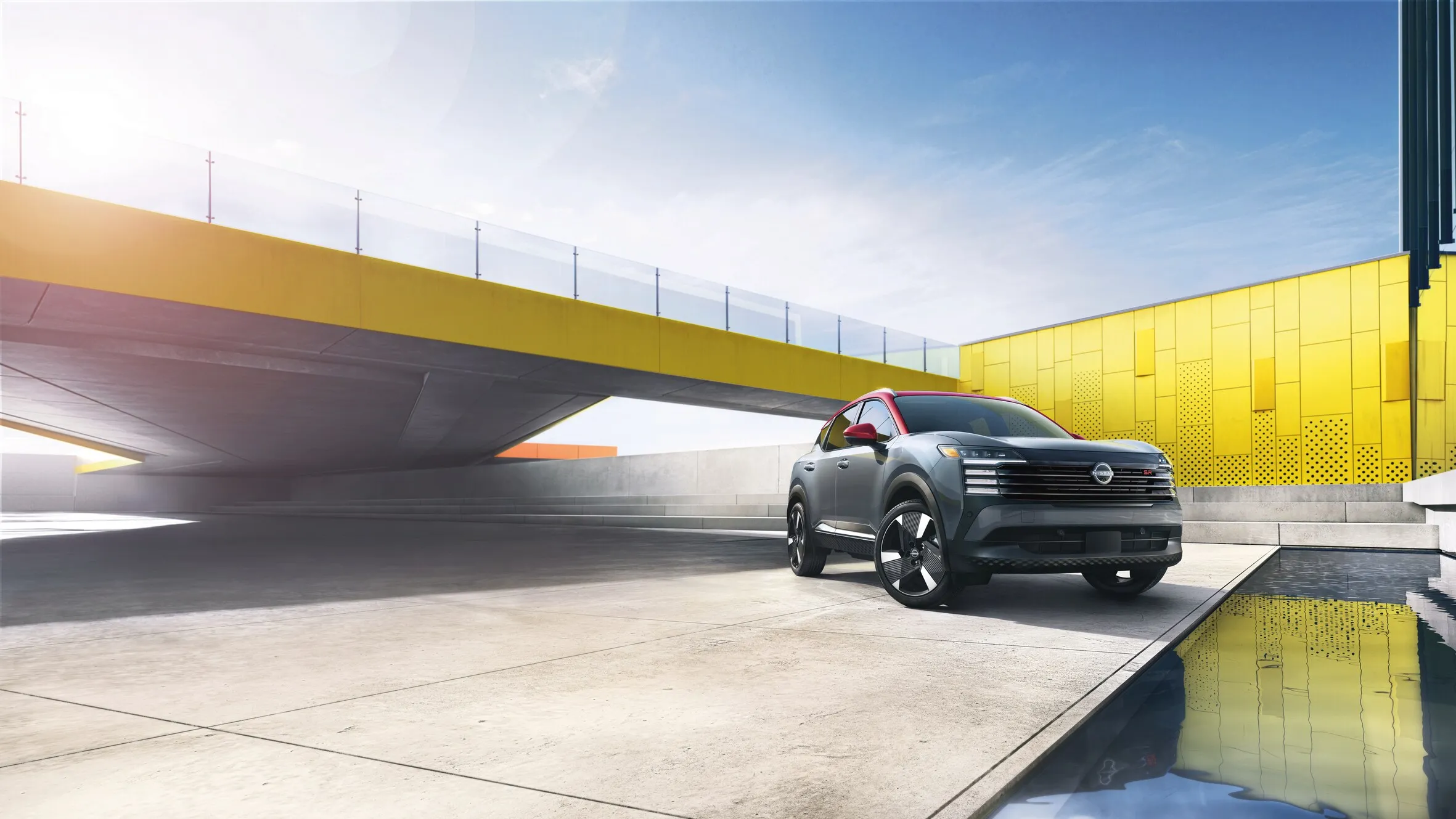 Nissan SUV in Modern Urban Architectural Setting Nissan SUV parked in a modern urban space with bold yellow architectural elements