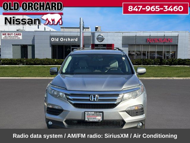 Used 2018 Honda Pilot EX-L with VIN 5FNYF6H80JB070647 for sale in Skokie, IL